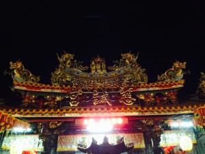 The night market is built around this temple.  People sit around outside and eat their night market snacks.